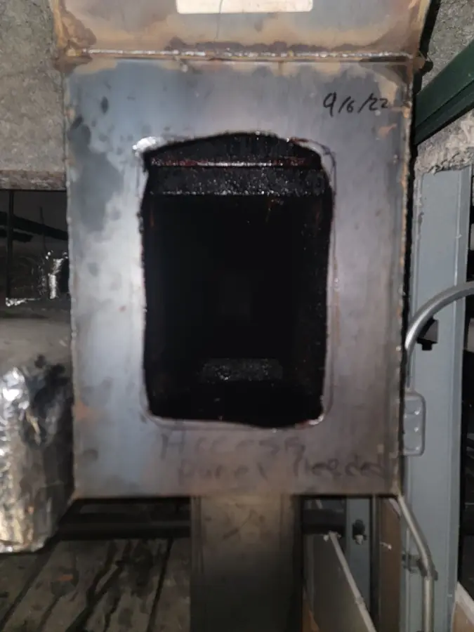 Kitchen exhaust duct access panel before cleaning